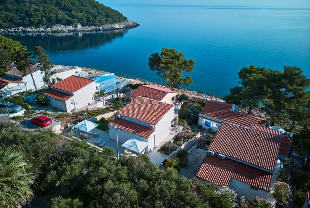 Apartment  Vitorio 3 - located by the beach of Vladarka Bay for 3 people in Mali Lošinj, Croatia.