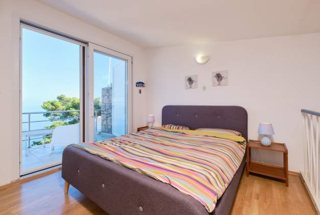 Apartment Vitorio 4 - Unterkunft für 2 Personen in der Bucht Valdarke, Mali Lošinj, Kroatien.